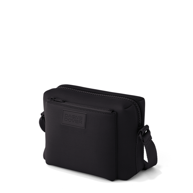 Dagne Dover Micah crossbody in black seen from an angle.